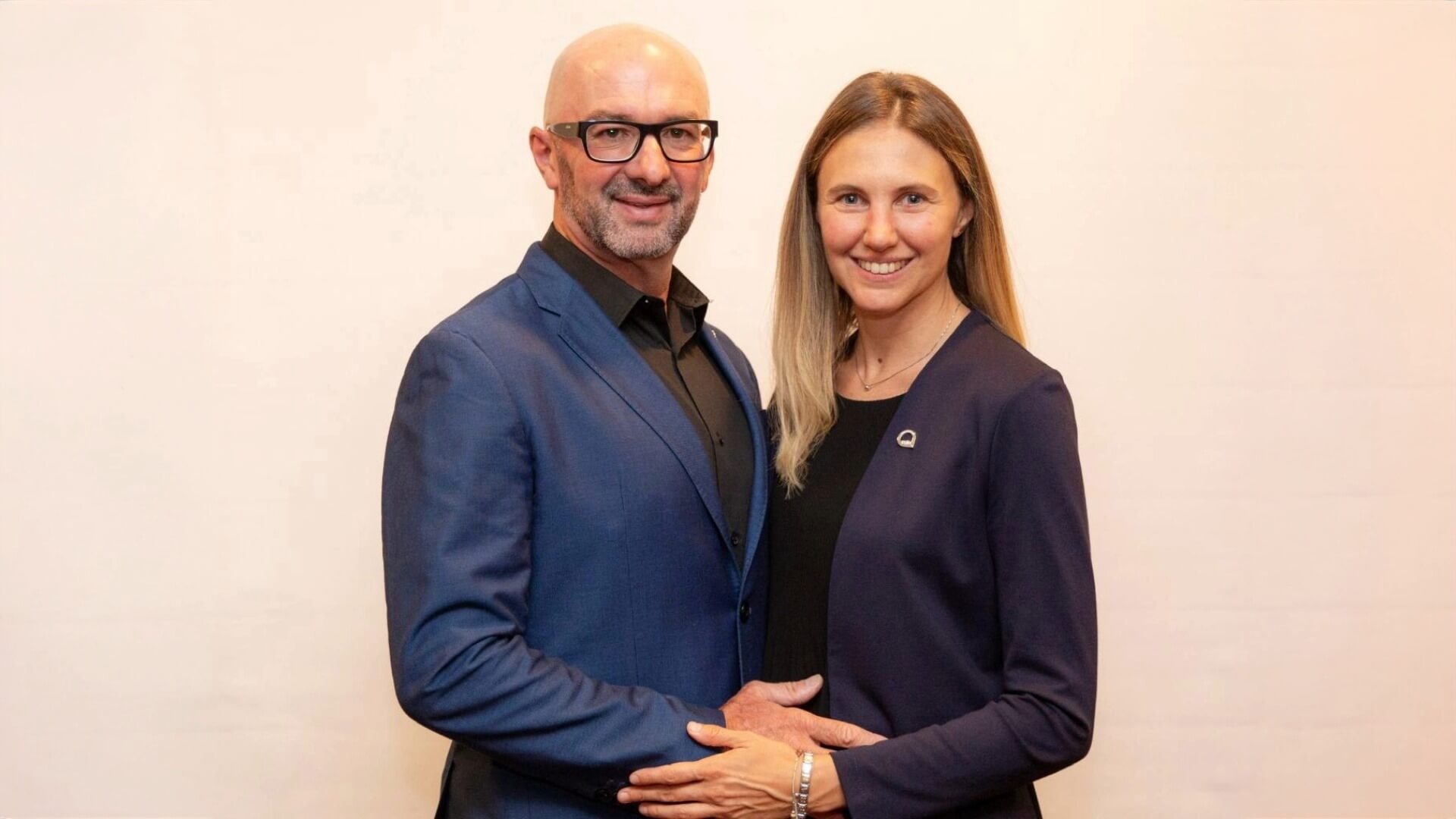 Smiling man and woman posing together